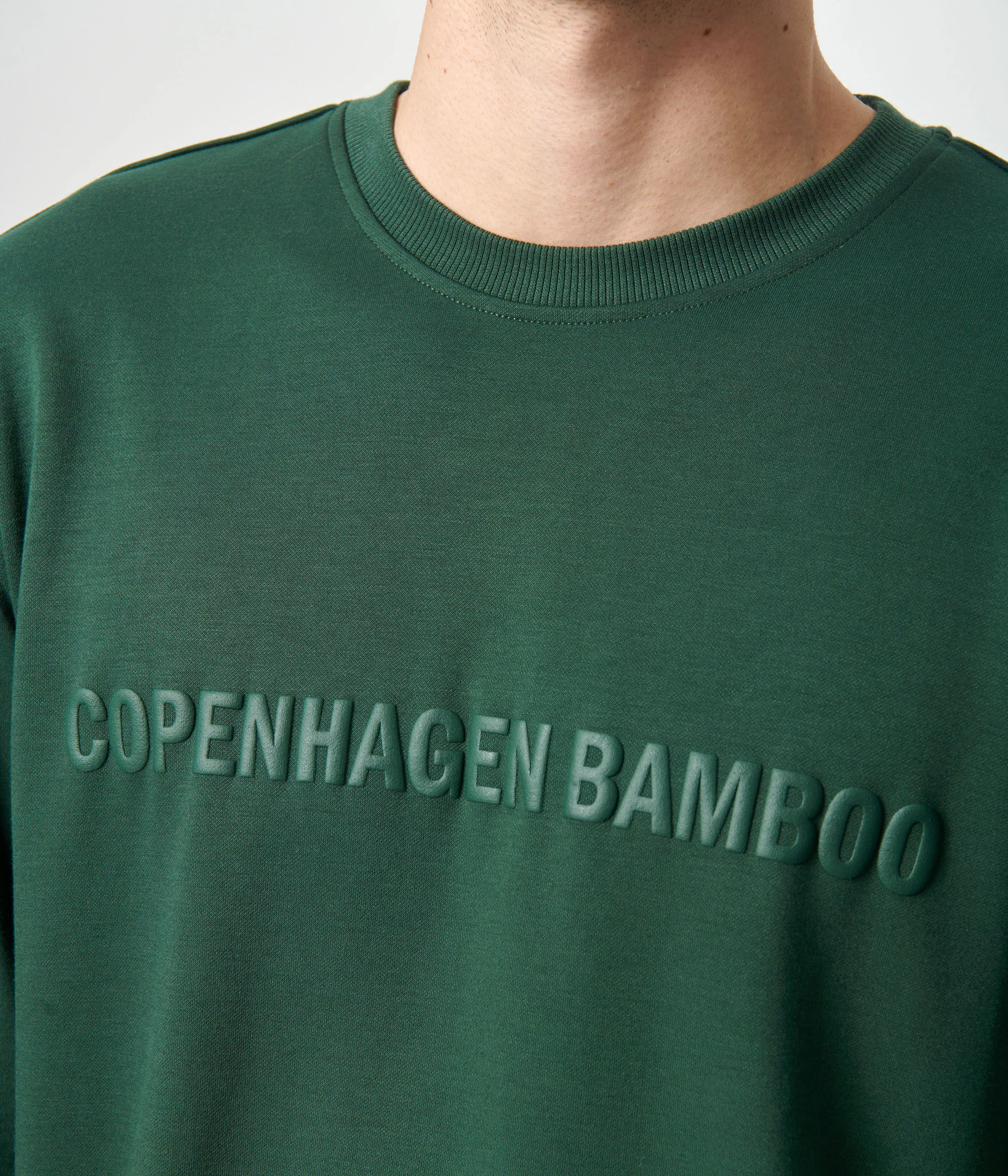 Green bamboo track suit with logo
